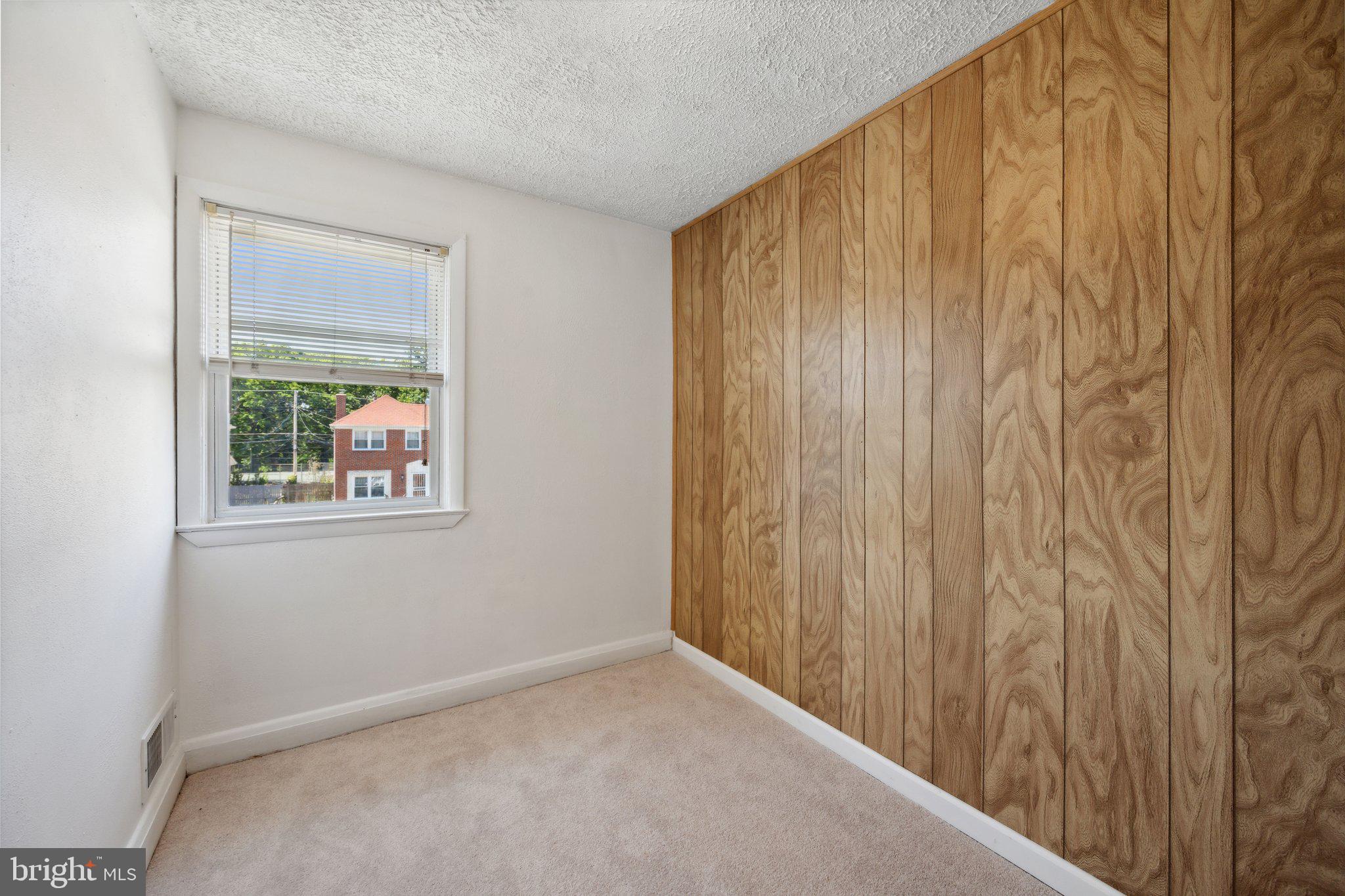 2116 Firethorn Road Middle River, MD 21220 - Photo 17 of 26 a view of an empty room with a window
