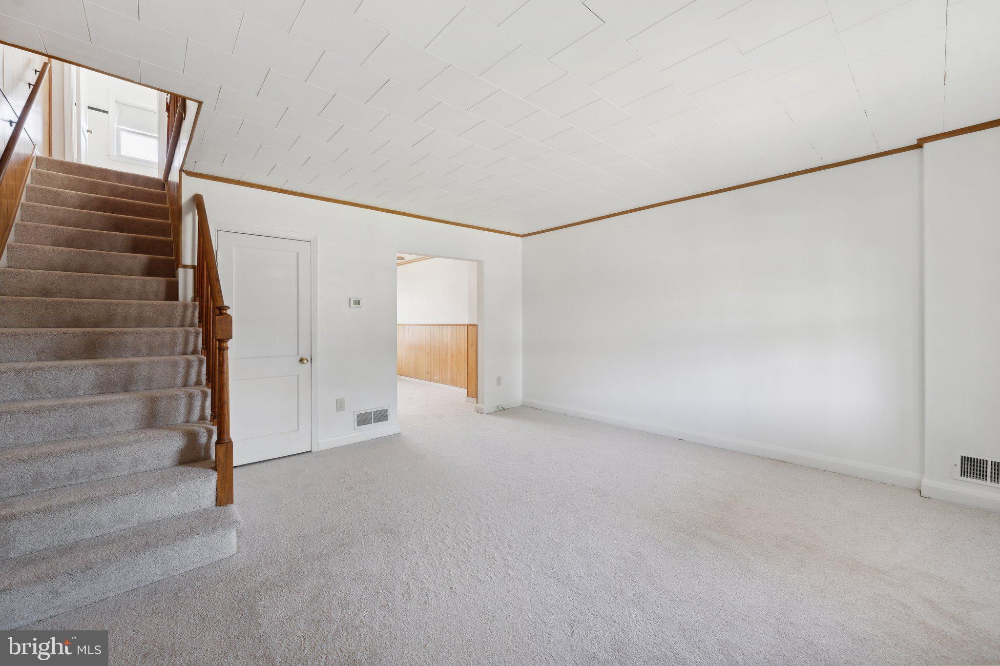 2116 Firethorn Road Middle River, MD 21220 - Photo 3 of 26 a view of an empty room with a window