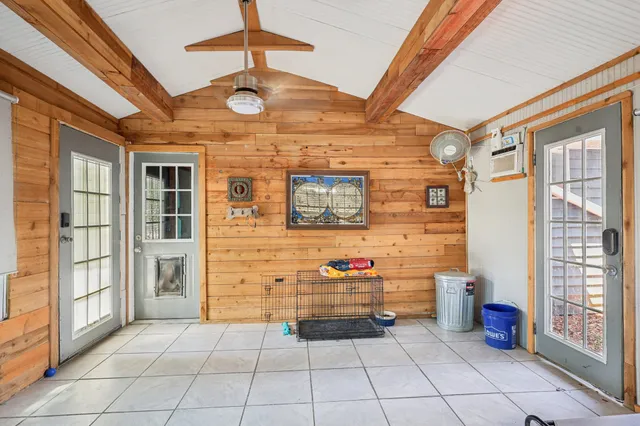 a view of an entryway with brick walls