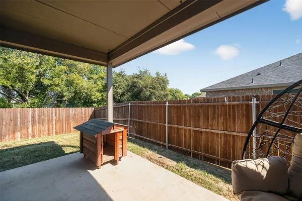 a view of a porch with furniture