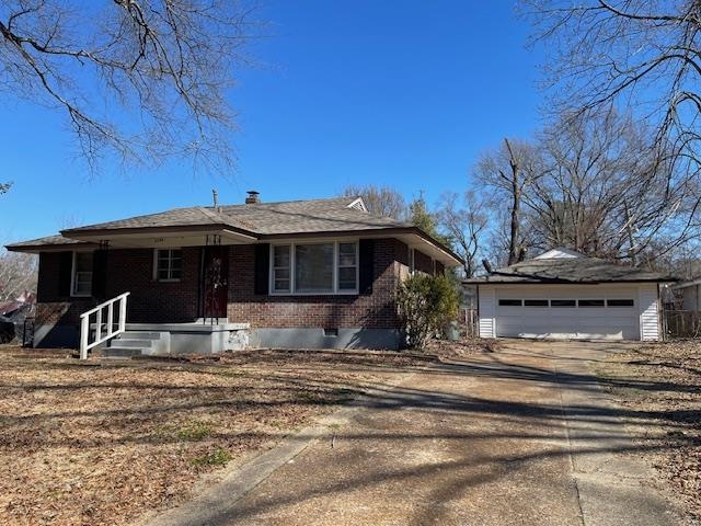 a view of a house with a large tree and wooden fence