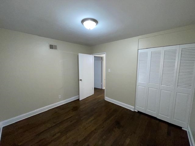 3284 Parham Street Memphis, TN 38127 - Photo 11 of 17 an empty room with wooden floor and closet