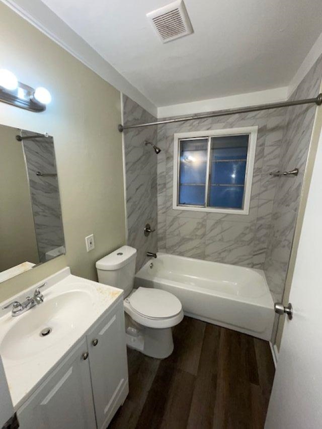 3284 Parham Street Memphis, TN 38127 - Photo 16 of 17 a bathroom with a sink a toilet and shower
