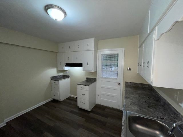 3284 Parham Street Memphis, TN 38127 - Photo 6 of 17 a view of a kitchen with refrigerator and wooden floor