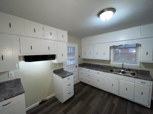 3284 Parham Street Memphis, TN 38127 - Photo 9 of 17 a kitchen with granite countertop white cabinets and sink
