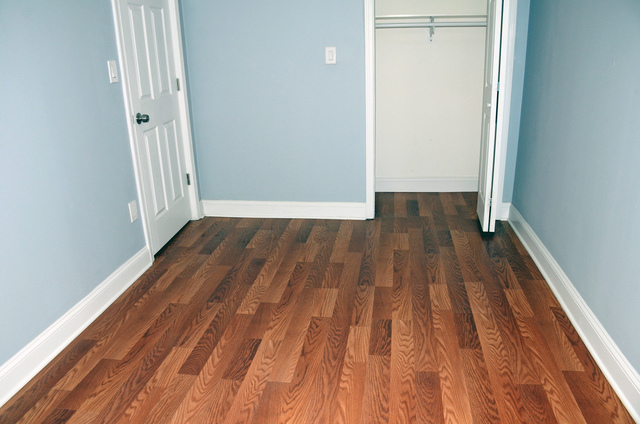 2449 North Ridgeway Avenue, Unit G Chicago, IL 60647 - Photo 6 of 7 a view of a room with wooden floor and white doors