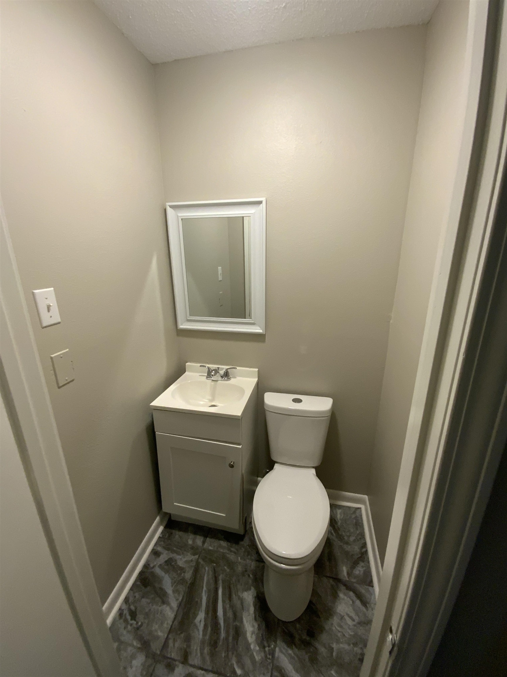3560 Steele Street Memphis, TN 38127 - Photo 12 of 19 a bathroom with a toilet and a sink