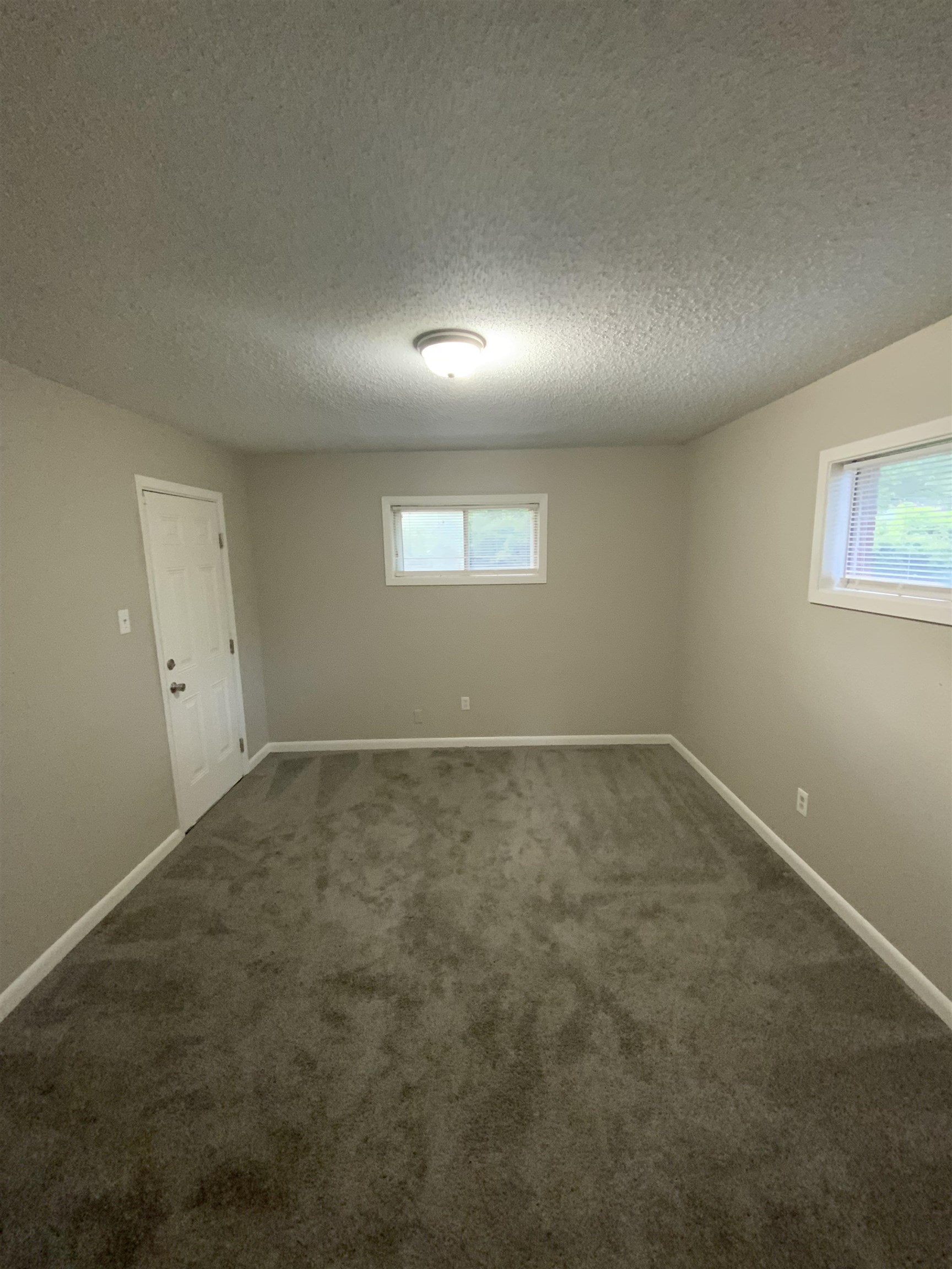 3560 Steele Street Memphis, TN 38127 - Photo 13 of 19 an empty room with a empty space and windows
