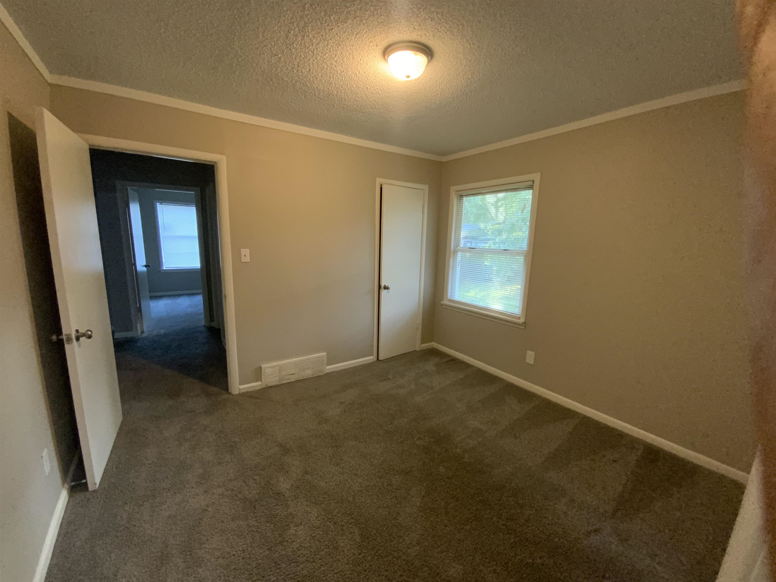 3560 Steele Street Memphis, TN 38127 - Photo 14 of 19 an empty room with windows
