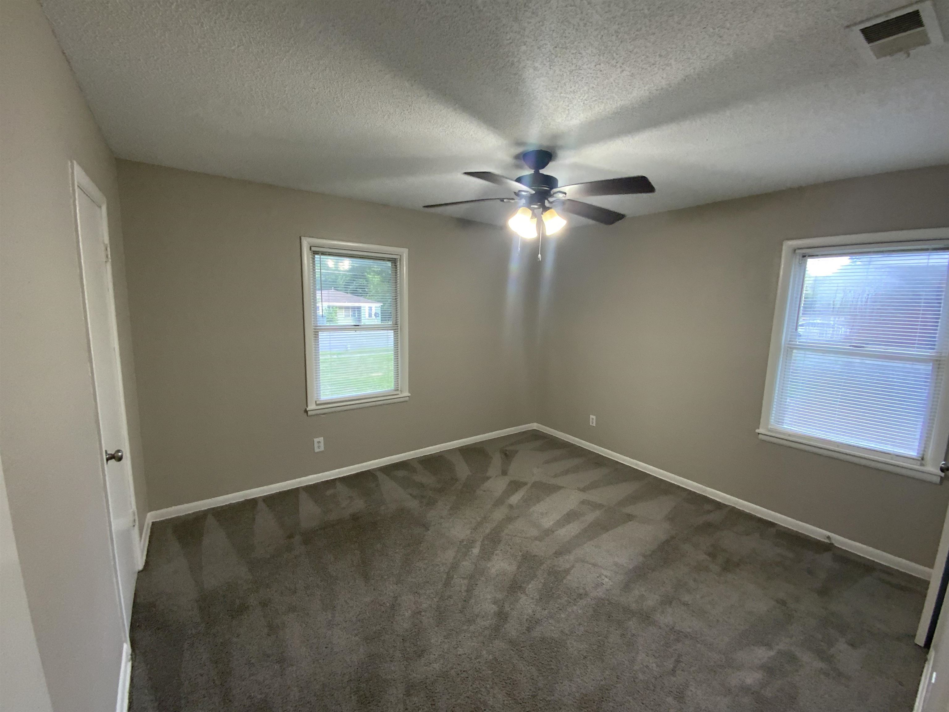 3560 Steele Street Memphis, TN 38127 - Photo 7 of 19 an empty room with a window