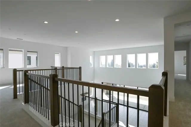 a view of a hallway with a bedroom