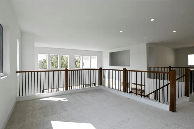 a bathroom with a toilet a sink and shower
