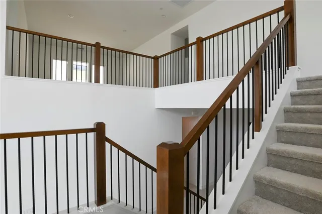 a view of an empty room and closet area