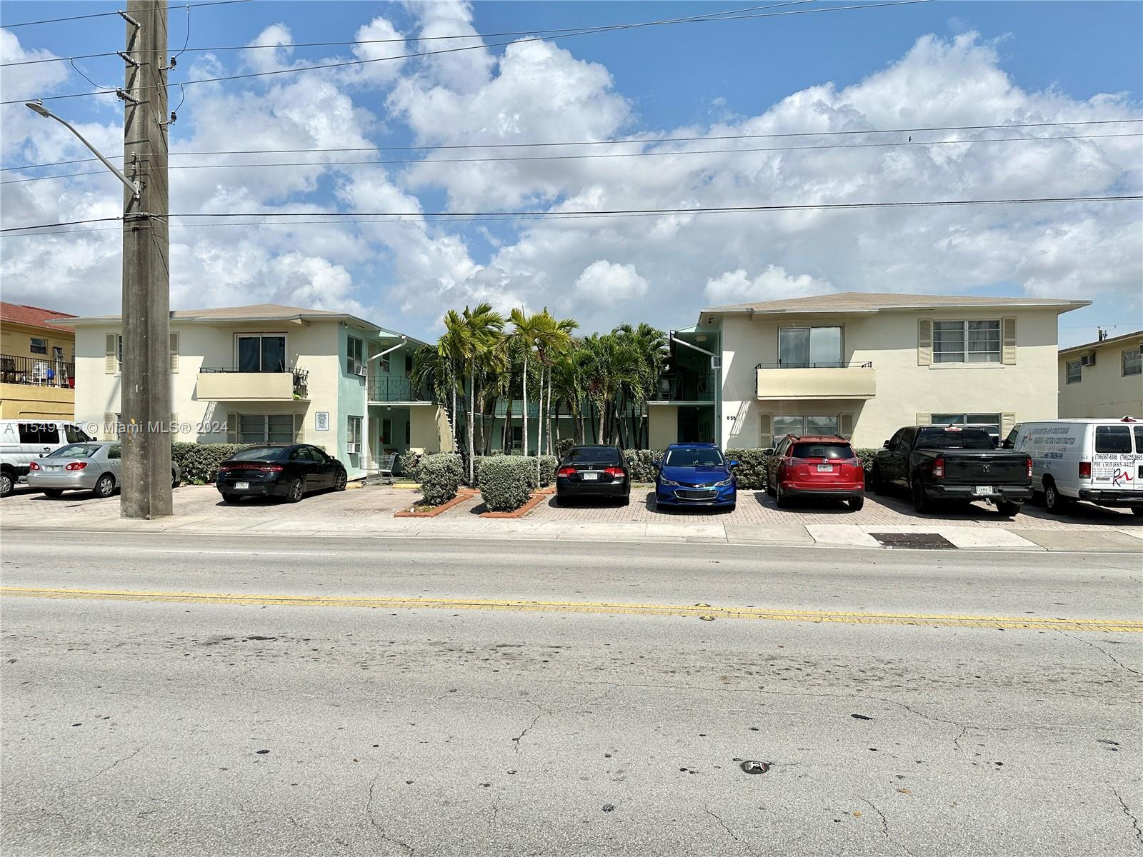 855 West 29th Street, Unit 14 Hialeah, FL 33012 - Photo 1 of 16 a car parked on the side of street