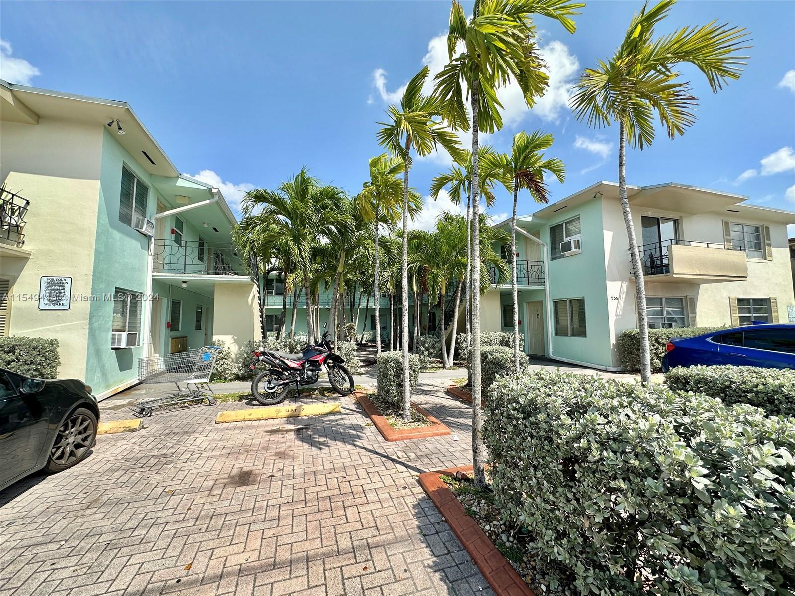 855 West 29th Street, Unit 14 Hialeah, FL 33012 - Photo 3 of 16 a view of a building with a patio
