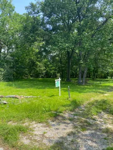 a view of a park with a slide