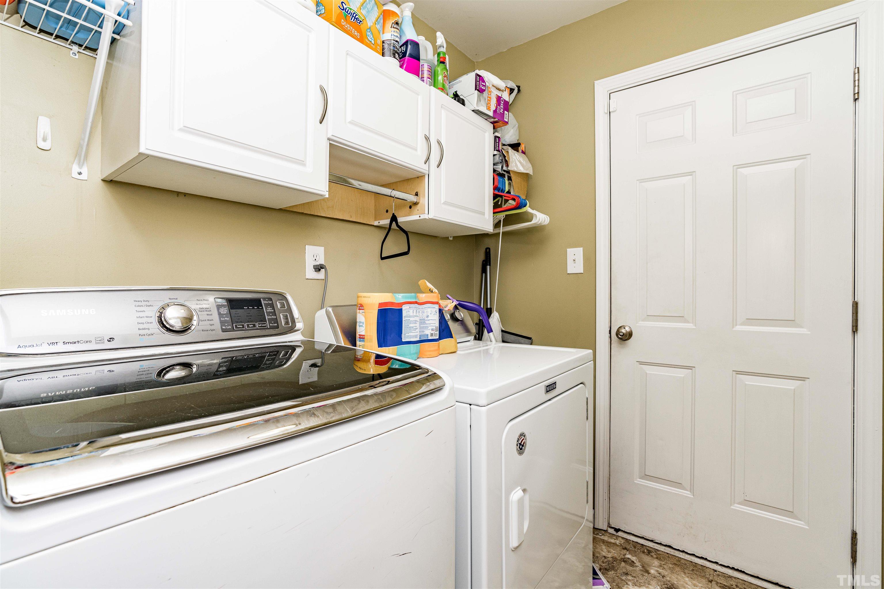 7200 Sunset View Court Willow Spring, NC 27592 - Photo 11 of 25 Laundry room between garage and kitchen area!