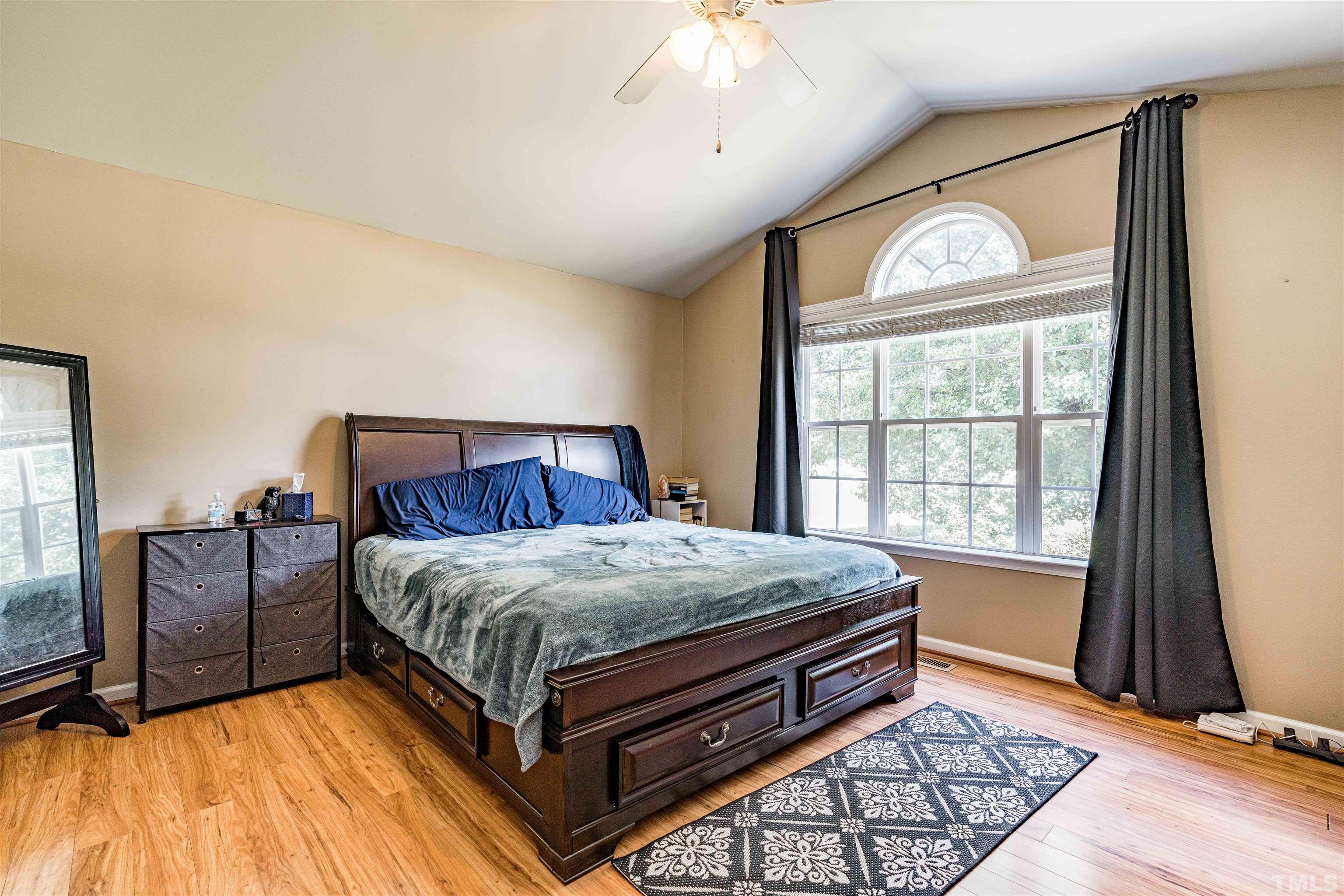 7200 Sunset View Court Willow Spring, NC 27592 - Photo 12 of 25 Spacious owner suite with cathedral ceiling and ensuite bath!