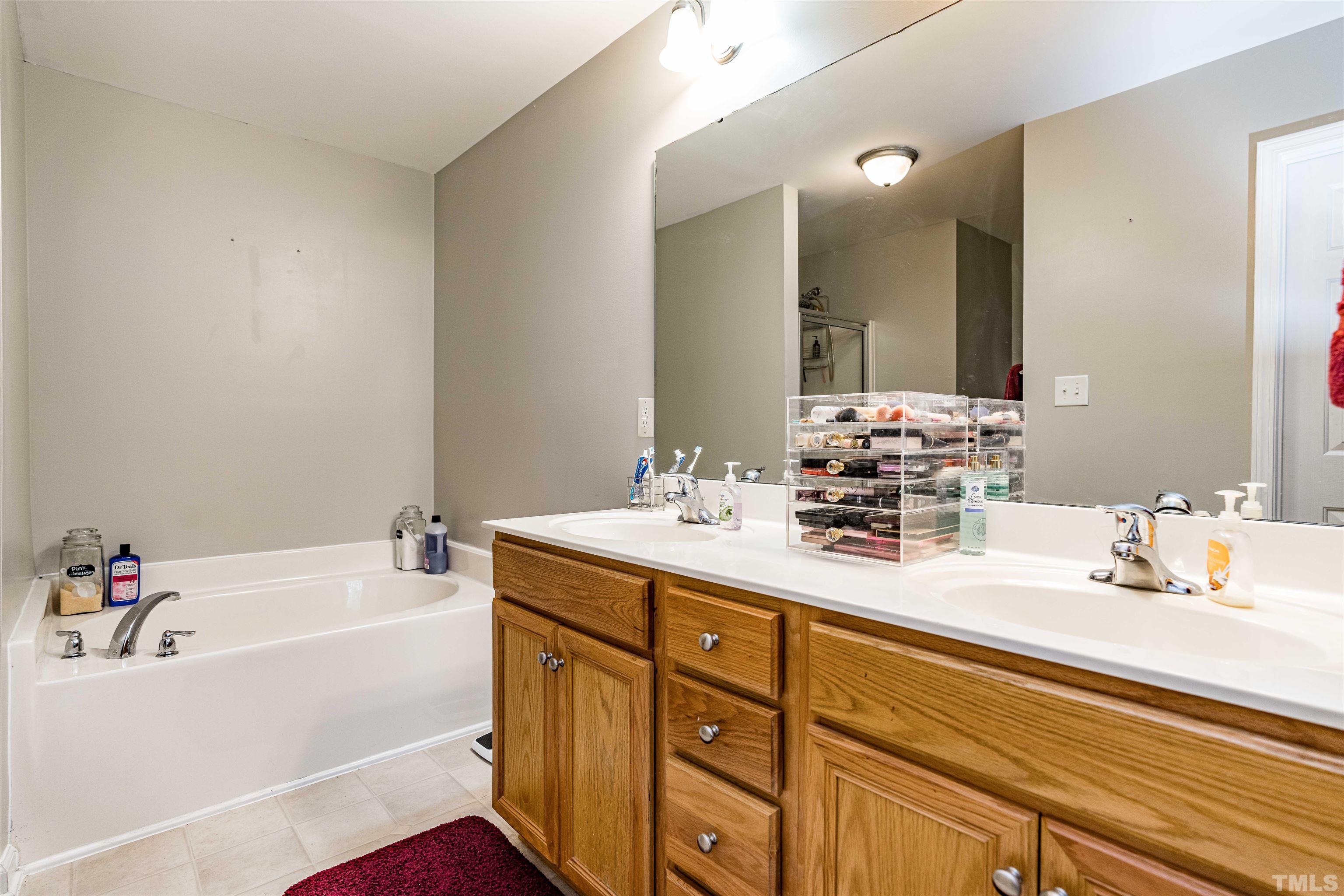 7200 Sunset View Court Willow Spring, NC 27592 - Photo 14 of 25 Dual vanities in owners suite!