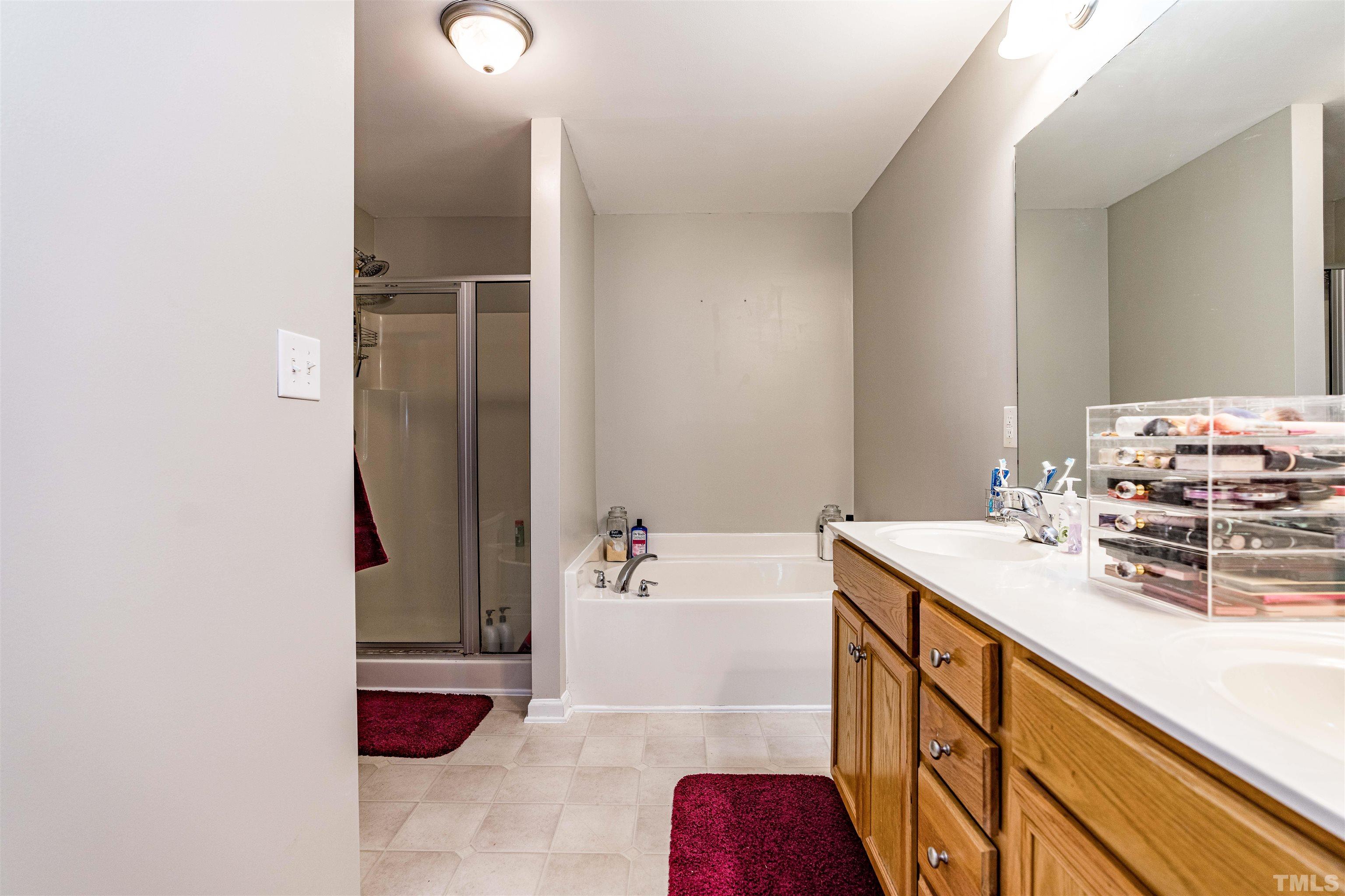 7200 Sunset View Court Willow Spring, NC 27592 - Photo 15 of 25 Garden tub and separate shower!
