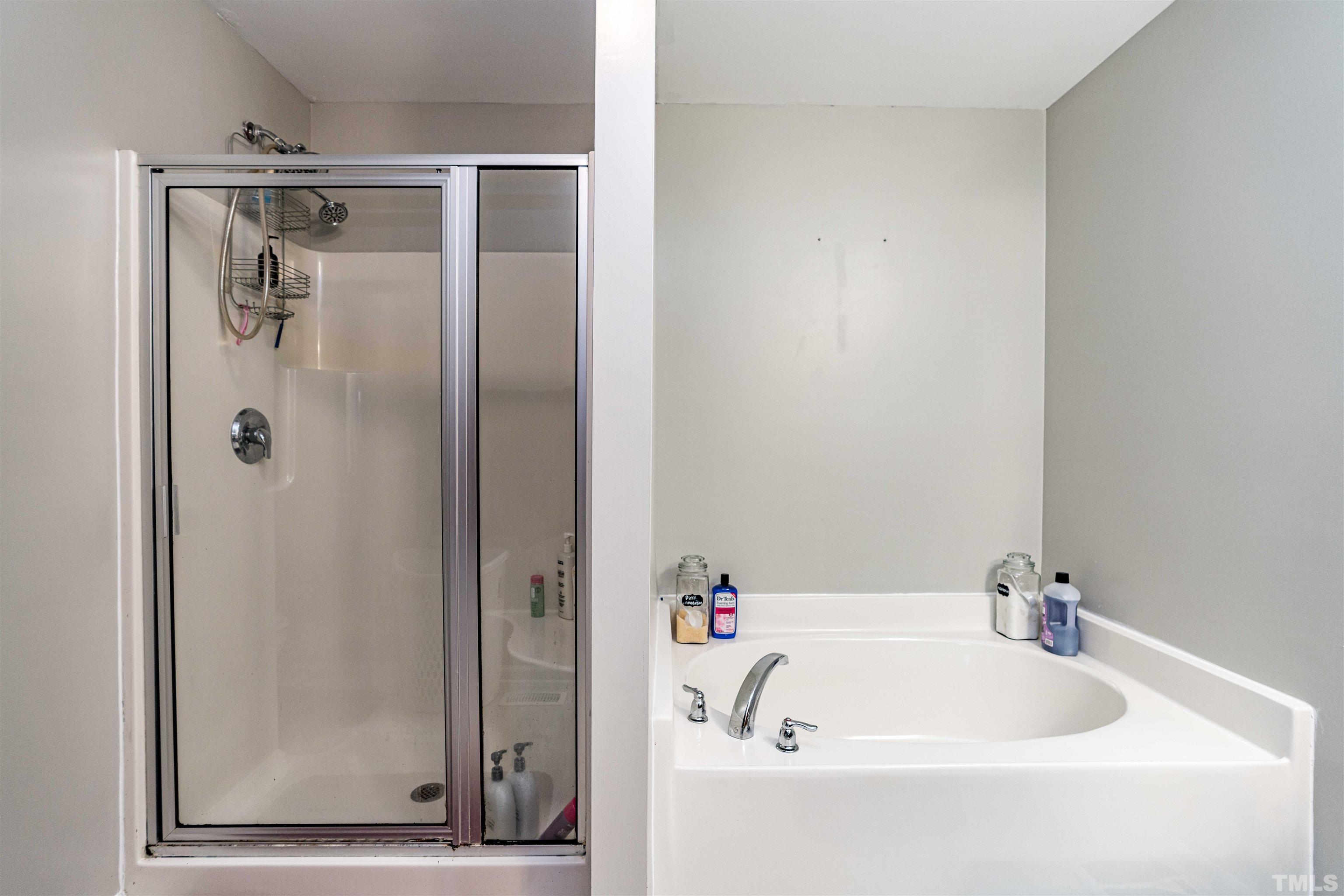 7200 Sunset View Court Willow Spring, NC 27592 - Photo 16 of 25 Dual vanities, garden tub and separate shower!