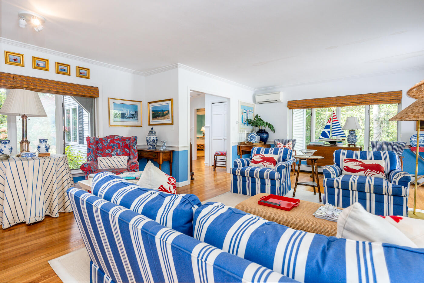46 Sea Marsh Road Centerville, MA 02632 - Photo 17 of 69 a living room filled with furniture and a floor to ceiling window