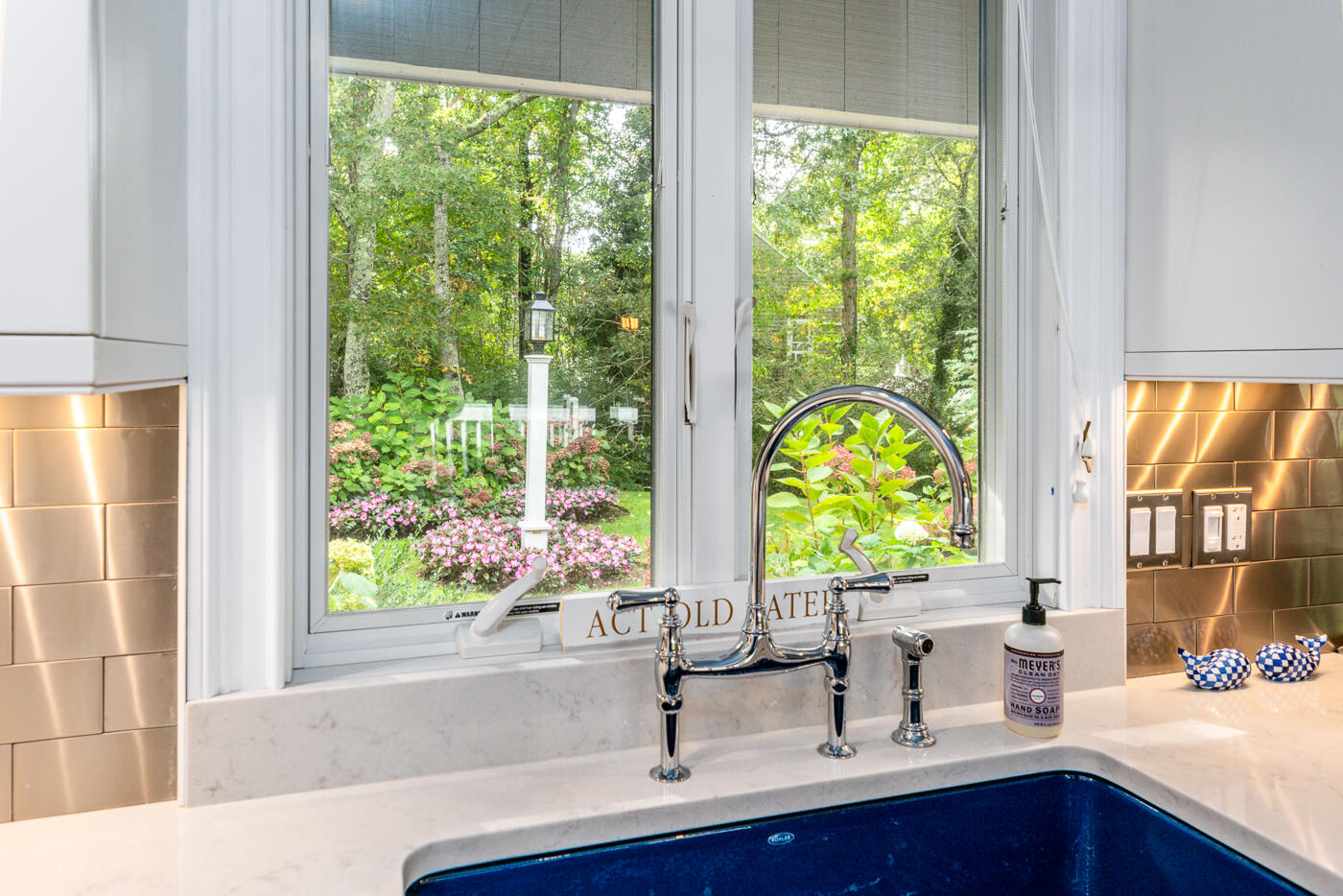 46 Sea Marsh Road Centerville, MA 02632 - Photo 21 of 69 a bathroom with a sink and large window