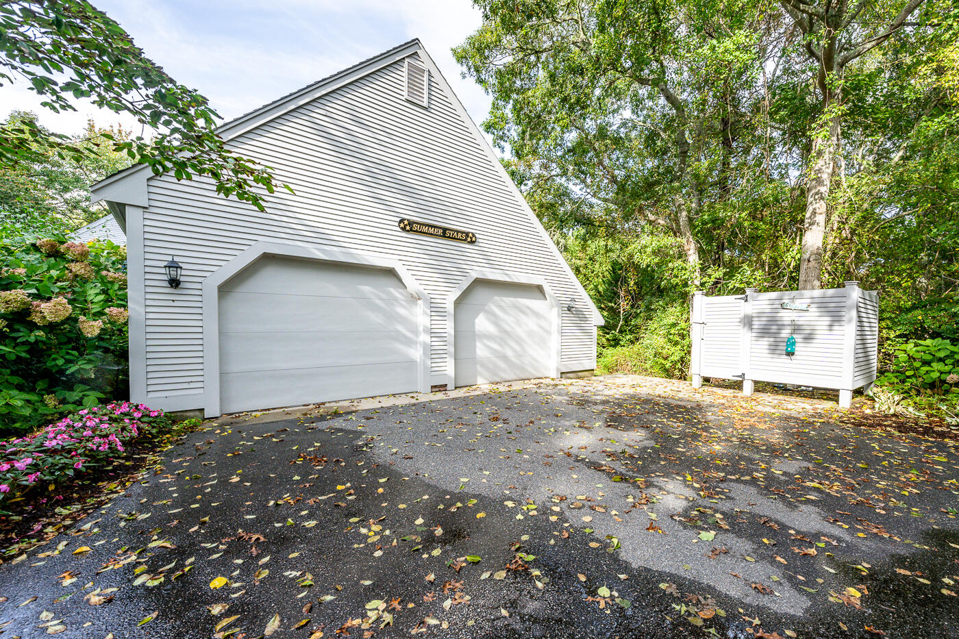 46 Sea Marsh Road Centerville, MA 02632 - Photo 38 of 69 a view of a house with a yard and garage