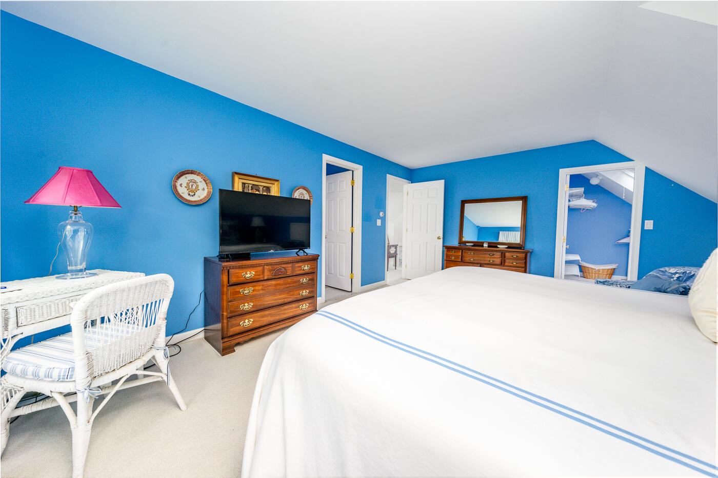 46 Sea Marsh Road Centerville, MA 02632 - Photo 40 of 69 a bedroom with a bed and a flat screen tv