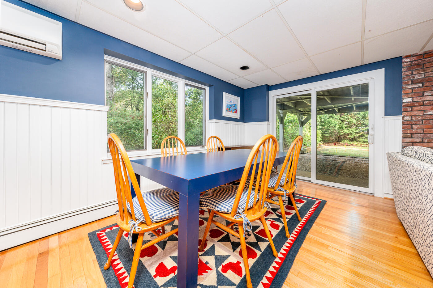 46 Sea Marsh Road Centerville, MA 02632 - Photo 48 of 69 a view of a dining room with furniture and wooden floor
