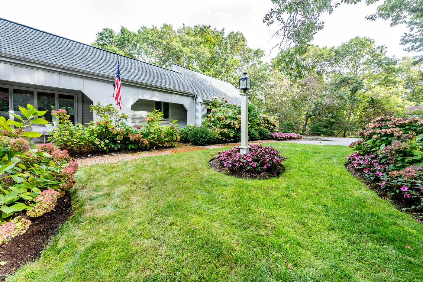 46 Sea Marsh Road Centerville, MA 02632 - Photo 6 of 69 a view of a house with garden and plants