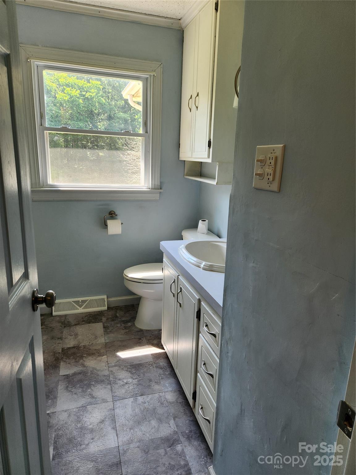 490 South Moose Road Mount Pleasant, NC 28124 - Photo 12 of 16 a bathroom with a sink toilet and a window