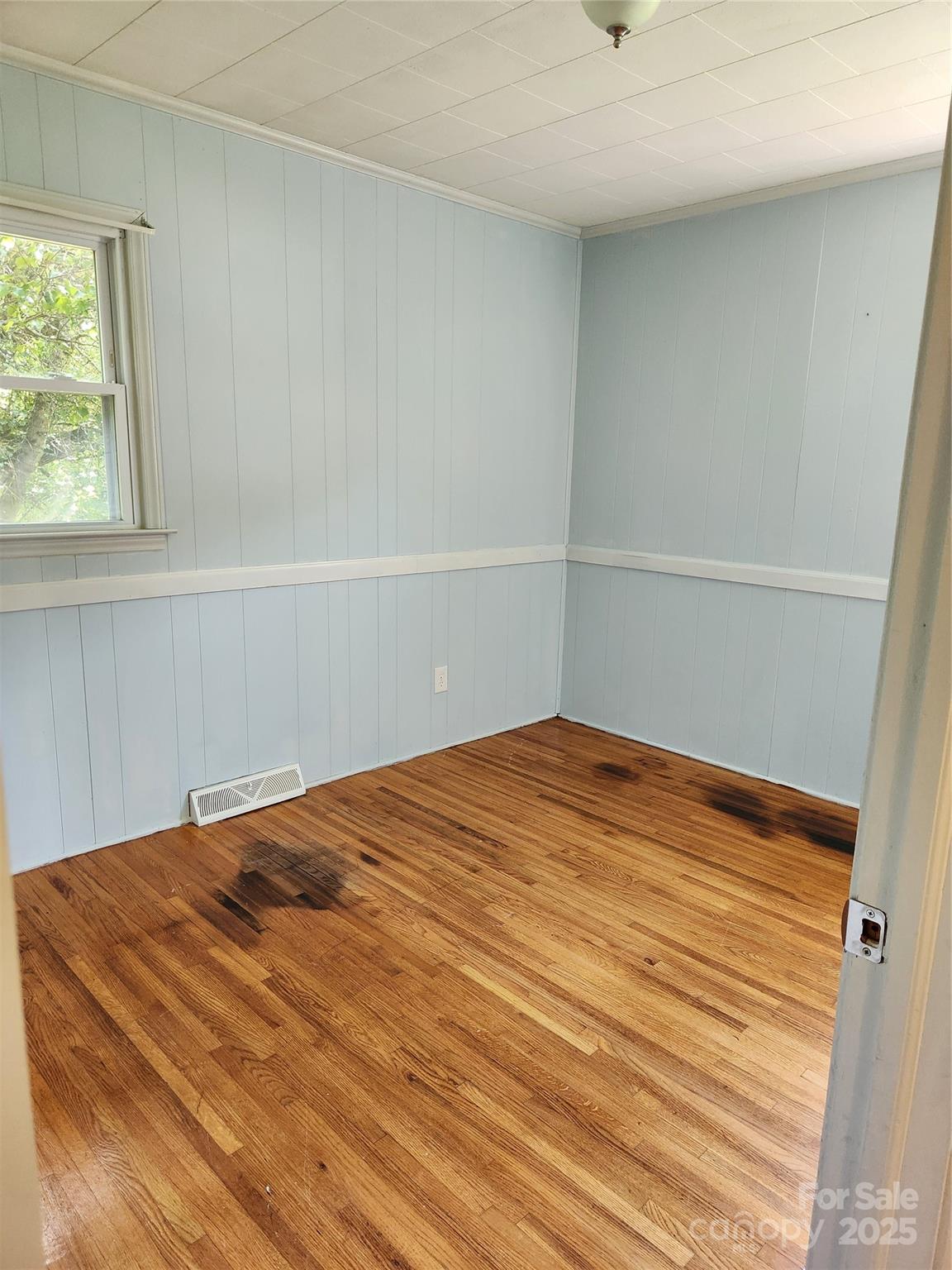 490 South Moose Road Mount Pleasant, NC 28124 - Photo 14 of 16 a view of empty room with wooden floor and fan