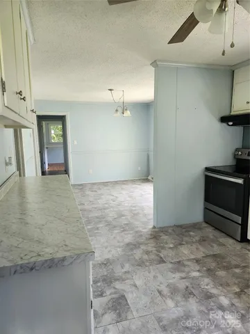 a view of a livingroom with wooden floor
