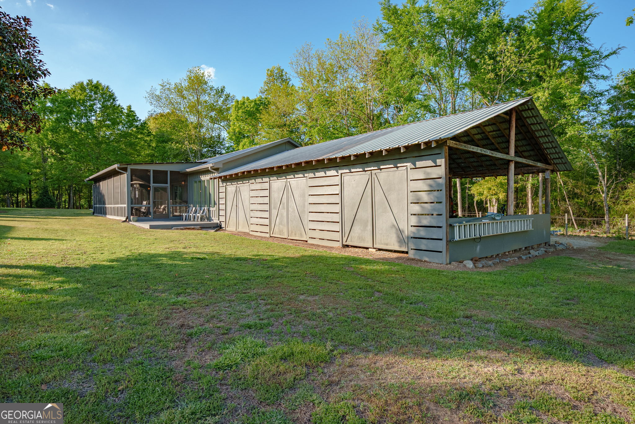 235 Glades Road Eatonton, GA 31024 - Photo 58 of 79 a front view of house with yard and green space