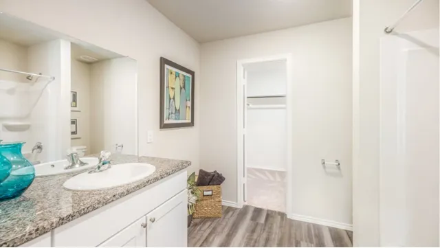 a bathroom with a bathtub sink and toilet