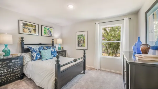 a workspace with furniture and window