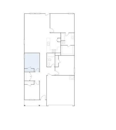 a front view of a house with lots of trees and plants