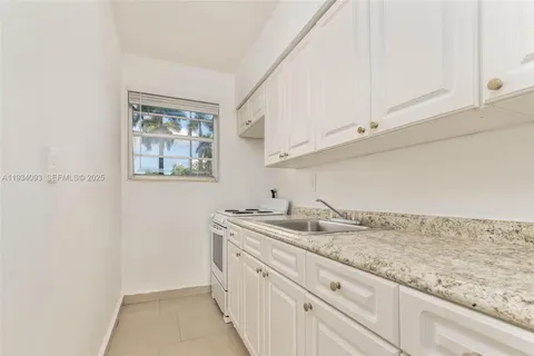 a bathroom with a sink and a vanity