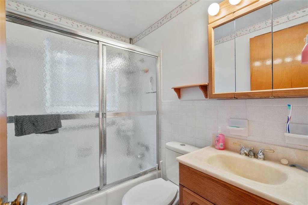 100 Longvue Drive Pittsburgh, PA 15237 - Photo 14 of 25 a bathroom with a sink toilet and shower