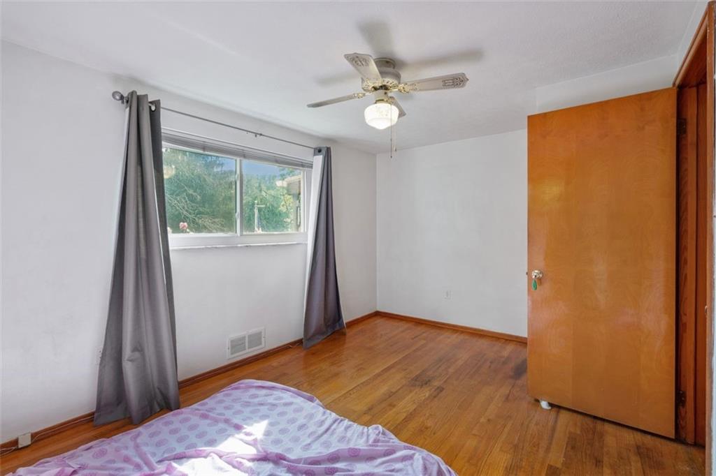 100 Longvue Drive Pittsburgh, PA 15237 - Photo 16 of 25 a bedroom with a bed and a window