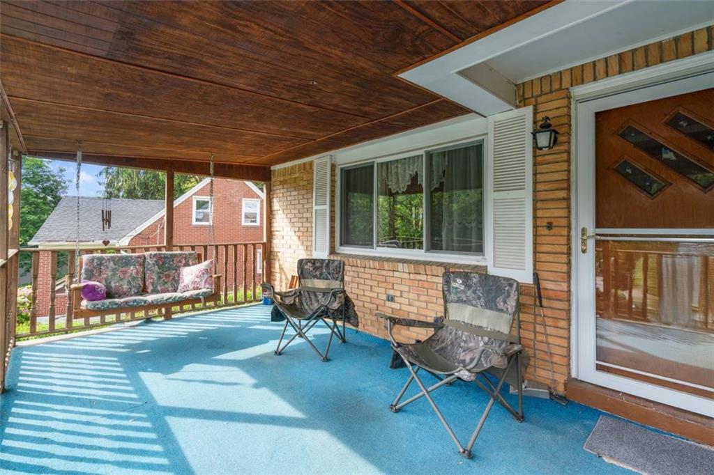 100 Longvue Drive Pittsburgh, PA 15237 - Photo 2 of 25 a balcony with furniture and a gate