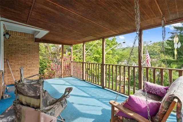 a balcony with furniture