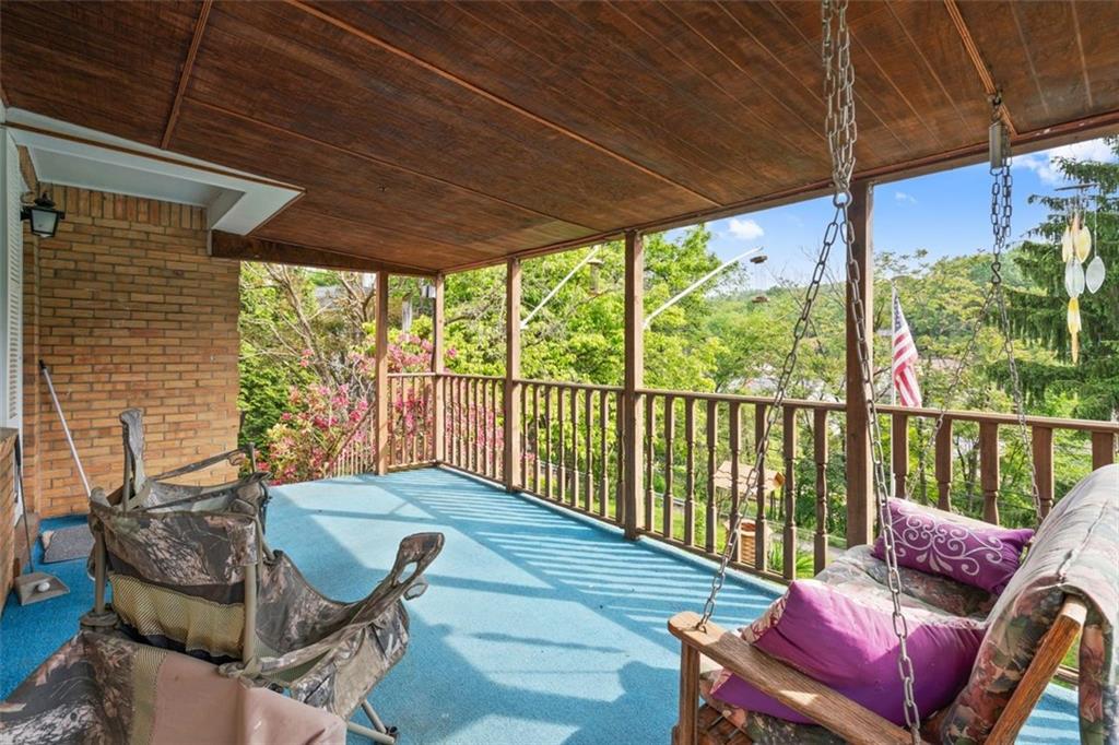 100 Longvue Drive Pittsburgh, PA 15237 - Photo 3 of 25 a balcony with furniture