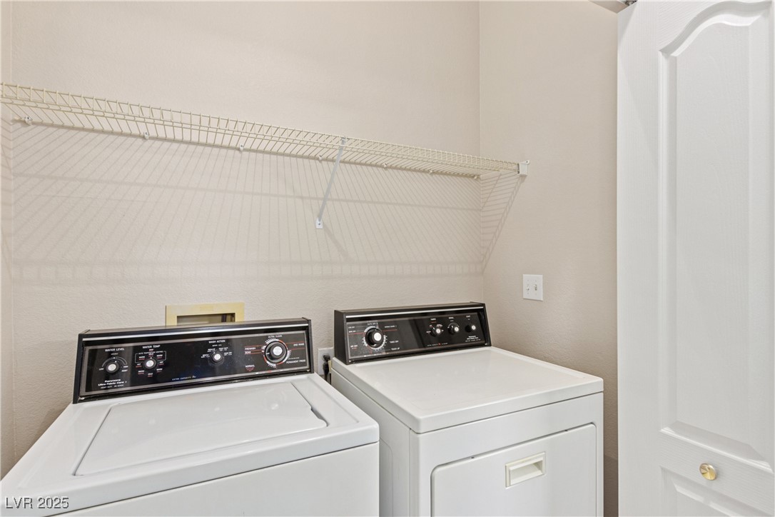5240 Island Chain Road Las Vegas, NV 89118 - Photo 20 of 26 Washroom with washing machine and clothes dryer