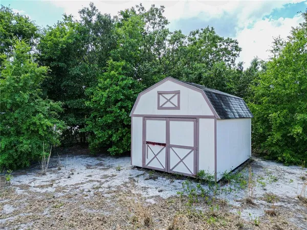 a view of a garden with a pathway