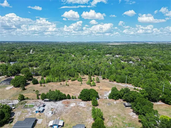 a view of a garden with an outdoor space