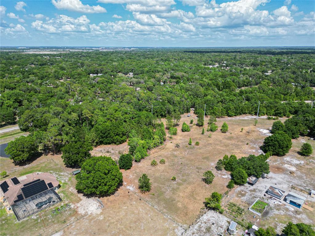 Coronet Road Mulberry, FL 33860 - Photo 17 of 17 a view of a garden with an outdoor space