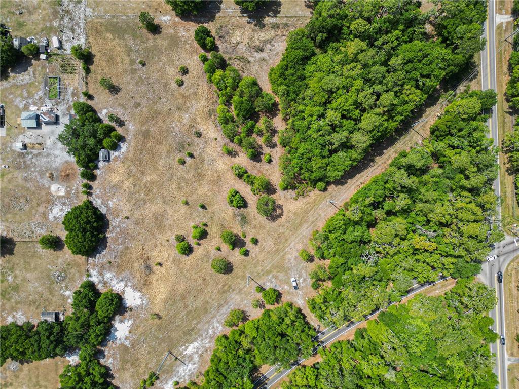 Coronet Road Mulberry, FL 33860 - Photo 10 of 17 an aerial view of a backyard of a house