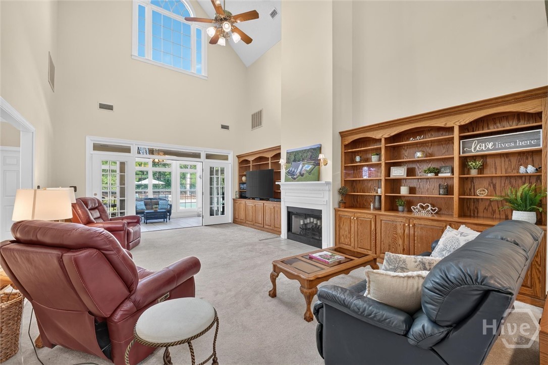 130 Cambridge Drive Rincon, GA 31326 - Photo 11 of 70 Cathedral Ceiling, Wood Burning Fireplace, Custom Built-Ins